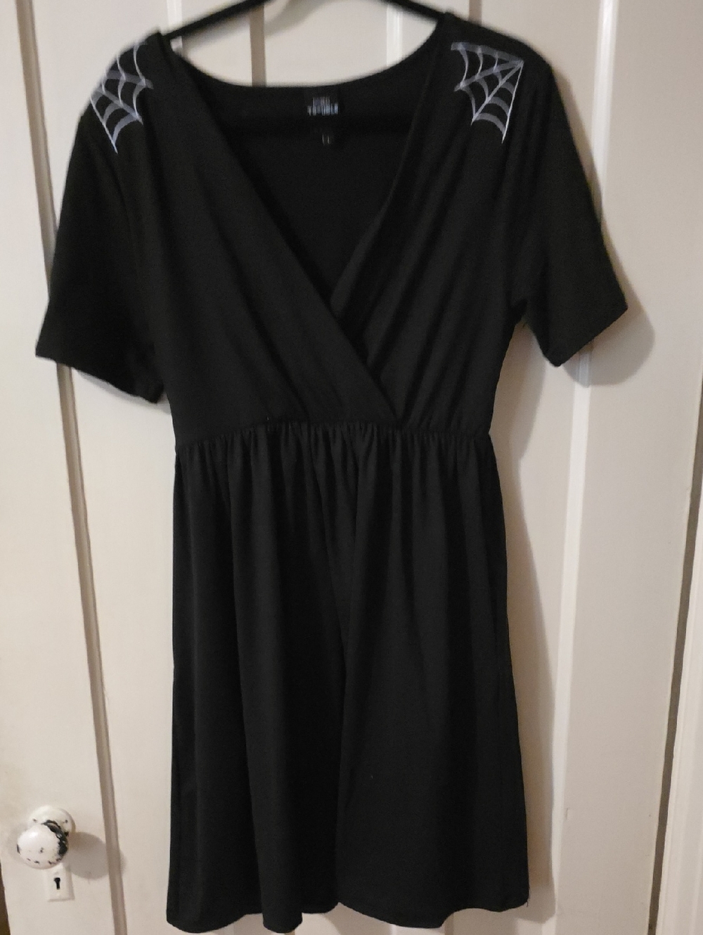 Black Short-Sleeve Wrap Dress with Spider Web Detail